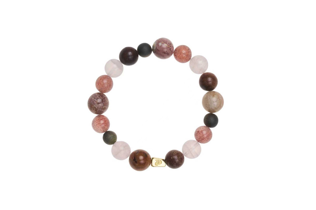 Strawberry Quartz and Red Jasper healing bracelet by ROCKBUND featuring polished beads on an elastic band.