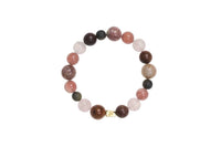 Strawberry Quartz and Red Jasper healing bracelet by ROCKBUND featuring polished beads on an elastic band.