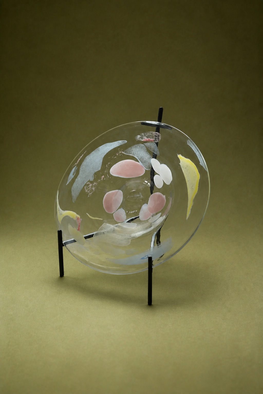 Luminous Fragment Glass Plate from TRLab Shop dinnerware collection, showcasing a decorative, luminous glass dinner plate with intricate design.