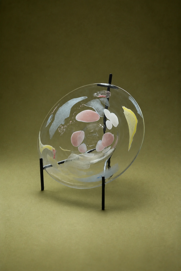 Luminous Fragment Glass Plate from TRLab Shop dinnerware collection, showcasing a decorative, luminous glass dinner plate with intricate design.