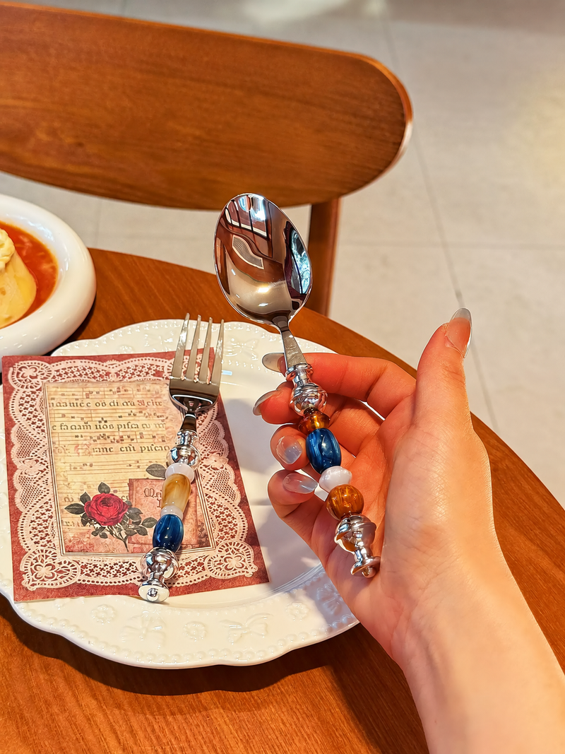 Multicolor bead cutlery set by TRLab Shop, featuring stylish and vibrant table confetti-themed utensils for festive dining.