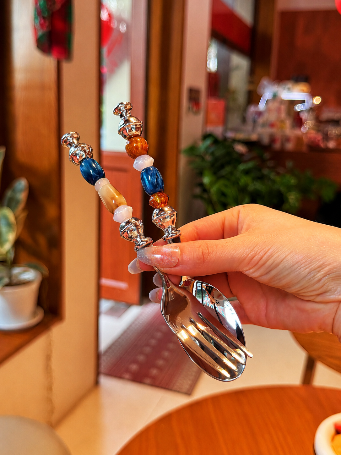 Multicolor bead cutlery set by TRLab Shop, including forks, knives, and spoons with vibrant bead accents.