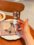 Multicolor bead cutlery set by TRLab Shop with decorative, bead-embellished utensils for stylish table settings.