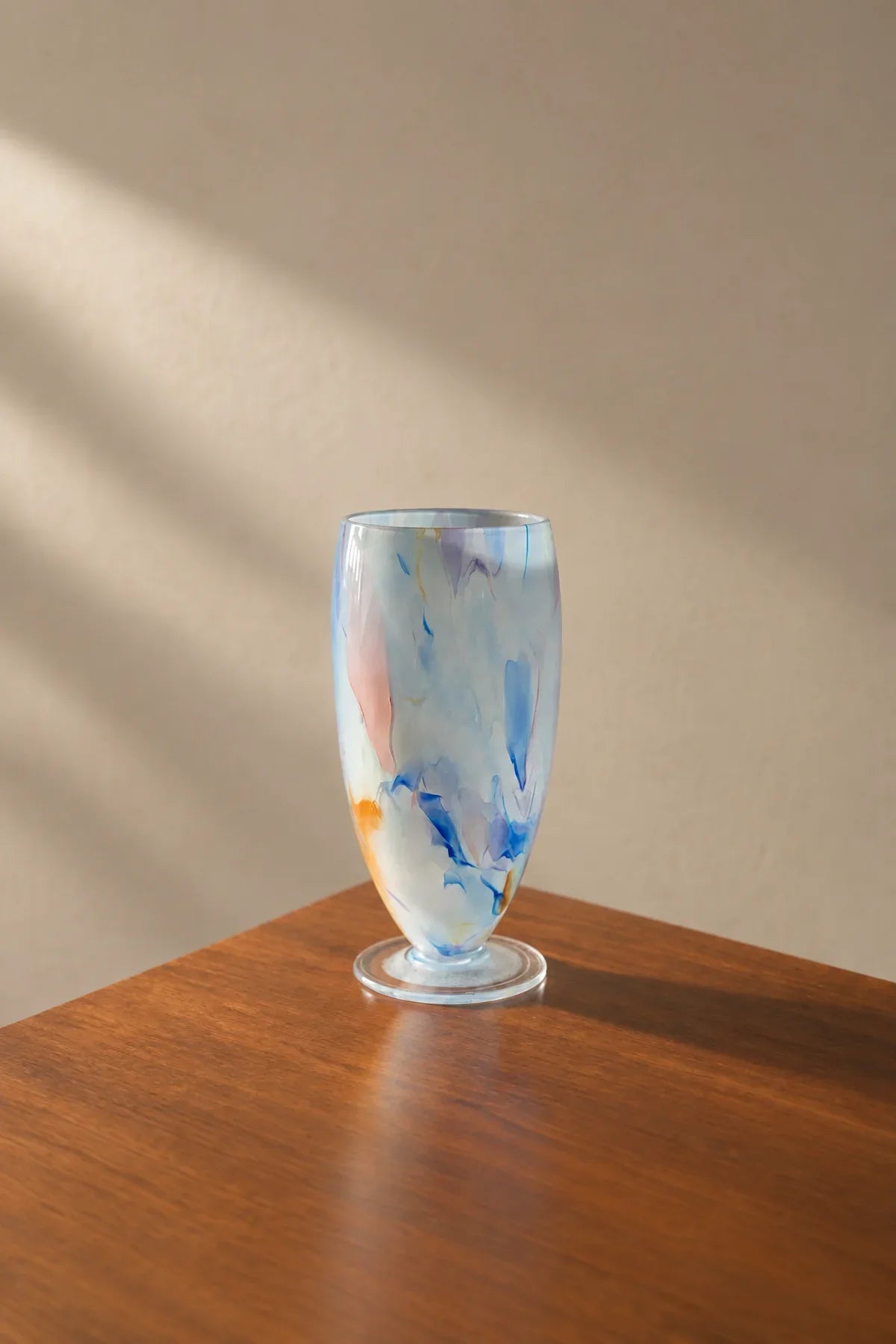 Painted Haze Pastel Glass-Look Flower Vase featuring an abstract pattern and footed design, perfect for floral arrangements.
