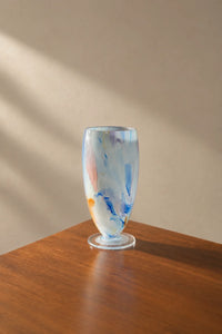 Painted Haze Pastel Glass-Look Flower Vase featuring an abstract pattern and footed design, perfect for floral arrangements.
