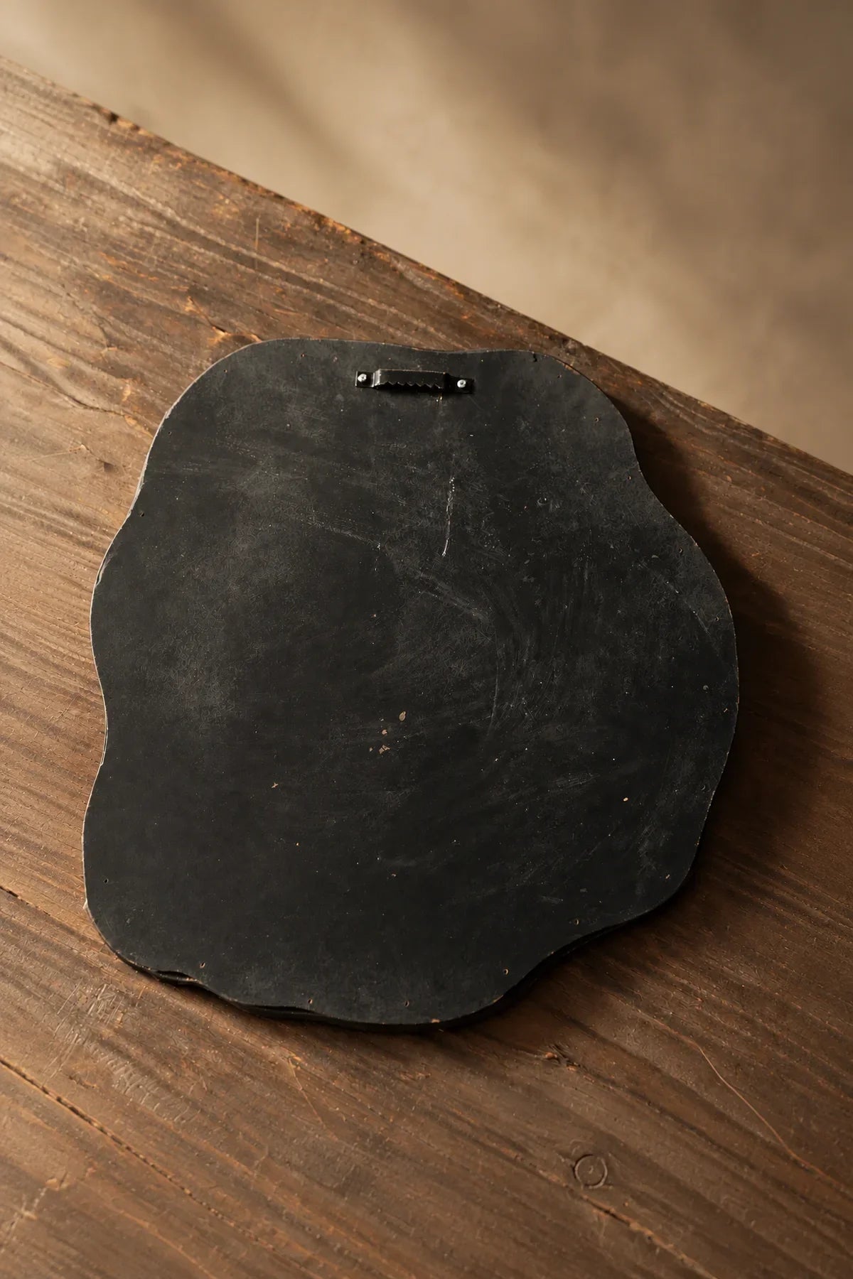 Earthbound Form Stone-Look Resin Decorative Mirror