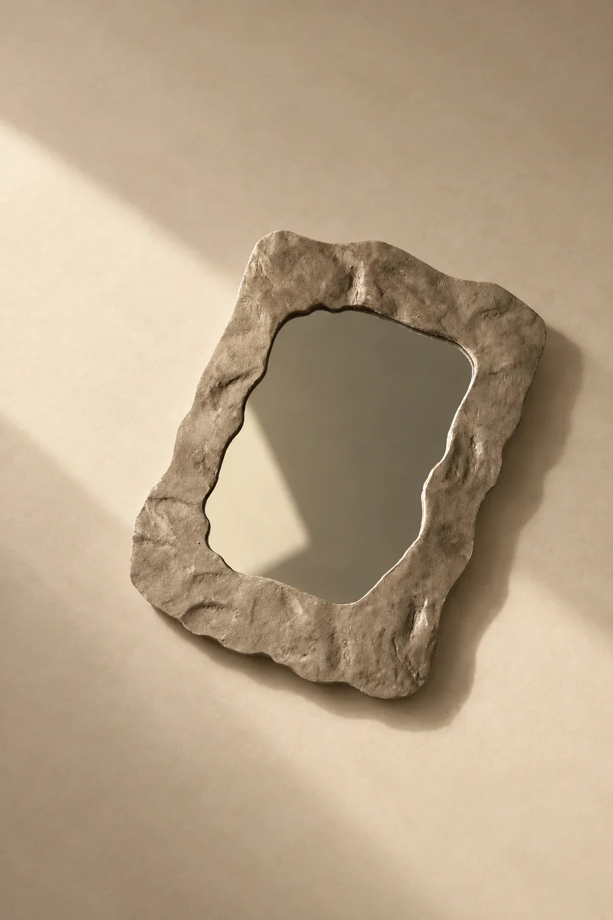 Earthbound Form Stone-Look Resin Decorative Mirror