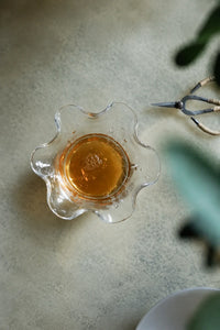 Gathered Petal Clear Seeded Glass Tea Cup